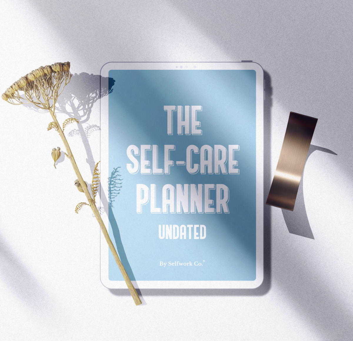 Self Care Planner on a tablet in a relaxed, mindful setting with neutral tones.