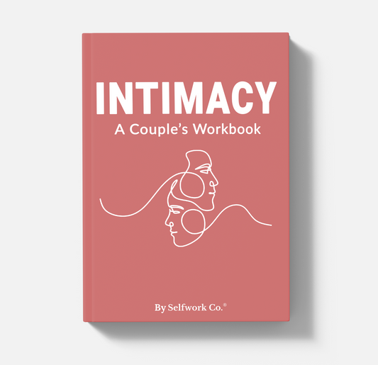 Book titled 'Intimacy: A Couple's Workbook' by Selfwork Co. on a white background