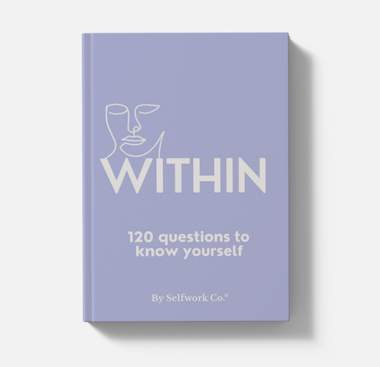 Within hardcover journal with soft purple cover, bold title, and floral icon
